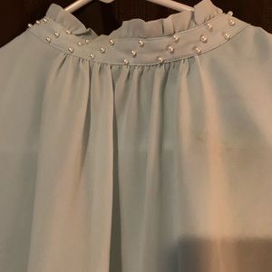 A nice light blue delicate blouse.